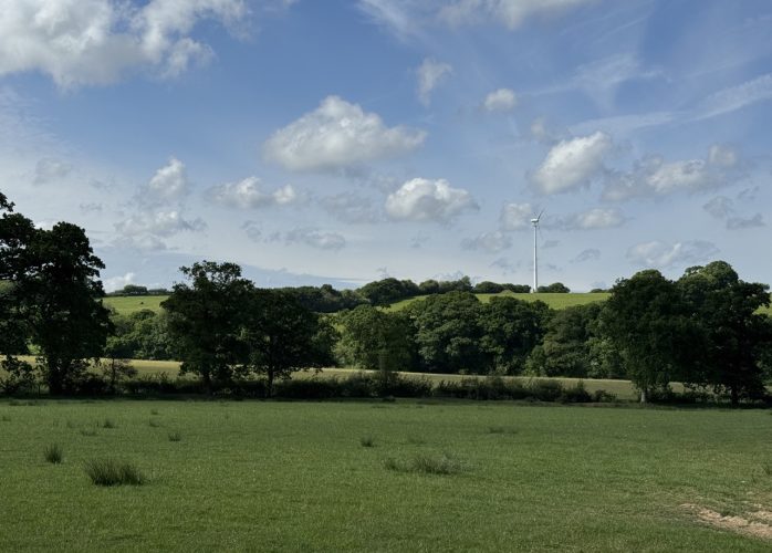 Fields with wind turbine in Highampton, Devon